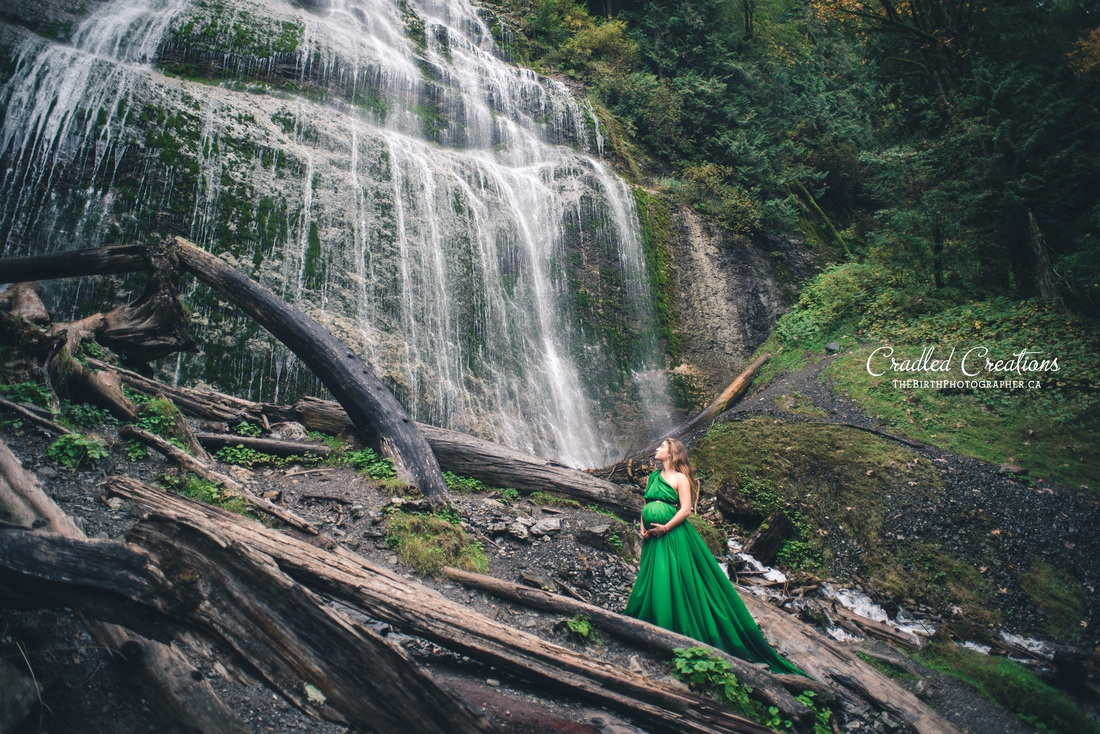 maternity gown pregnant by waterfall