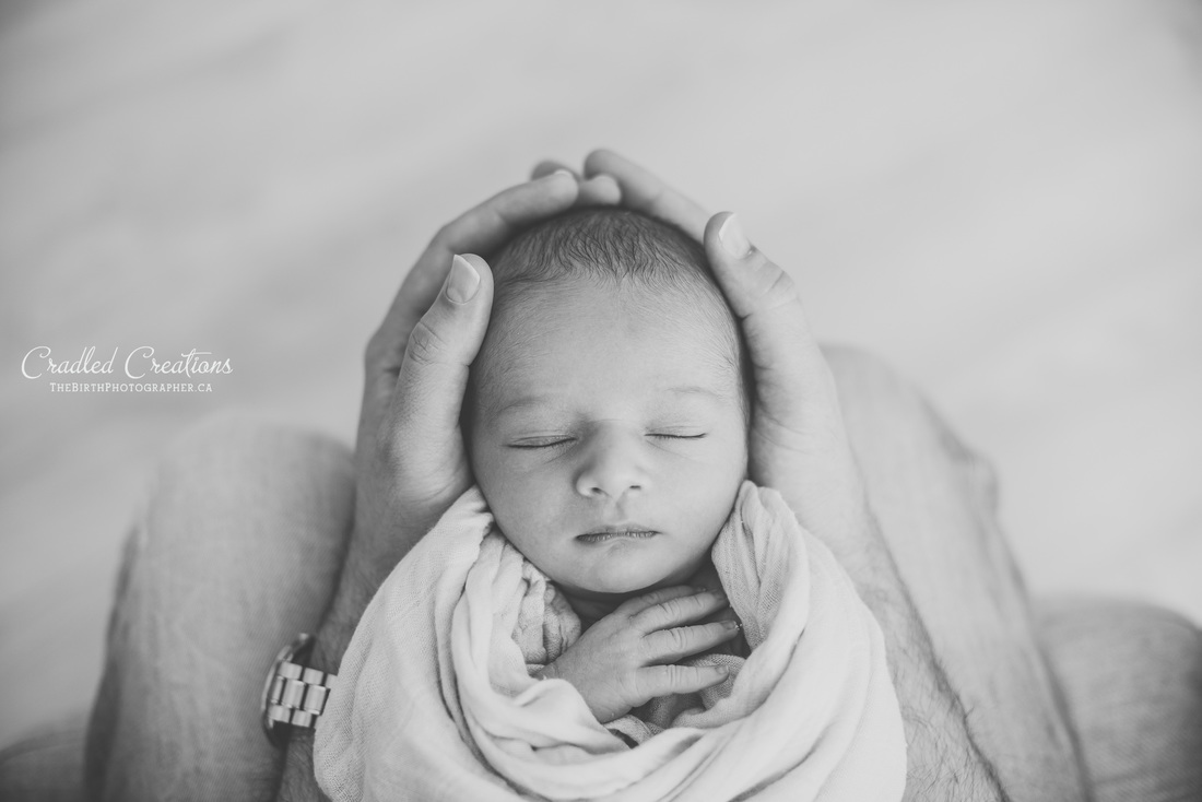 beautiful black and white photo of a newborn