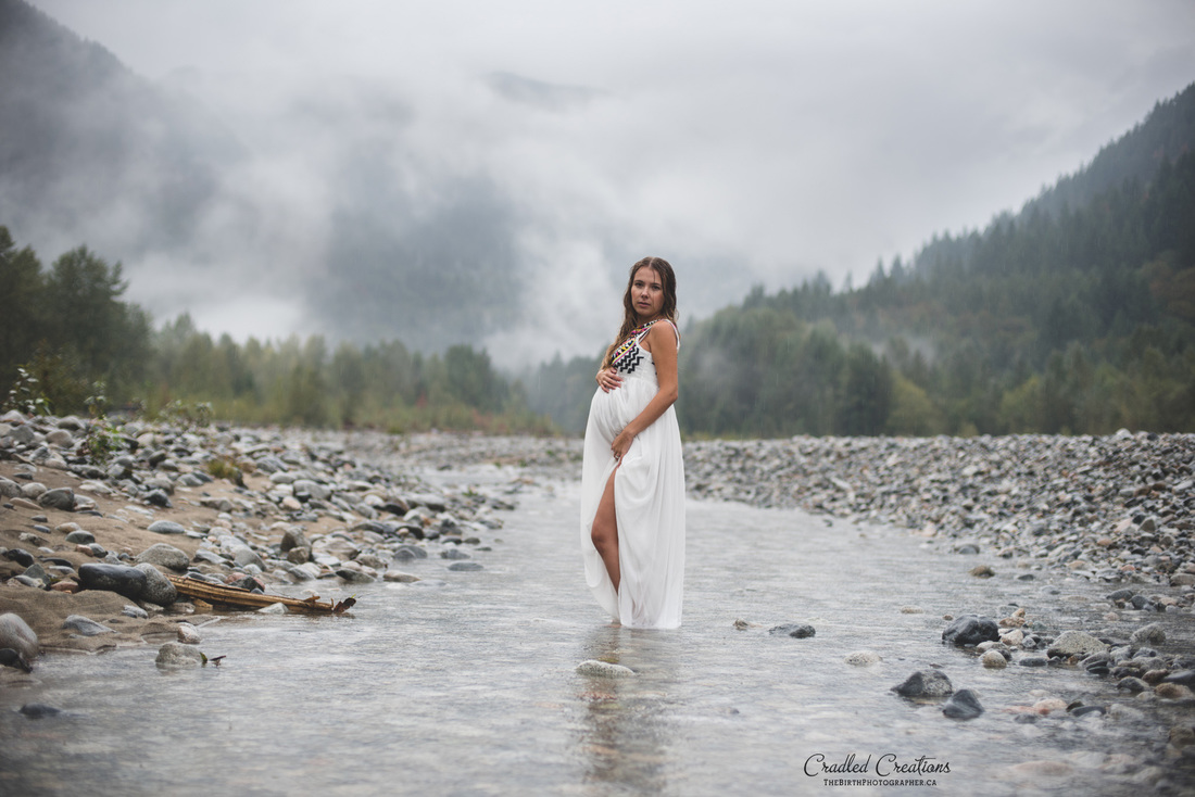 pregnant in river and rain