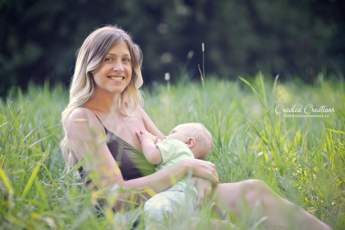 breastfeeding nursing in grass