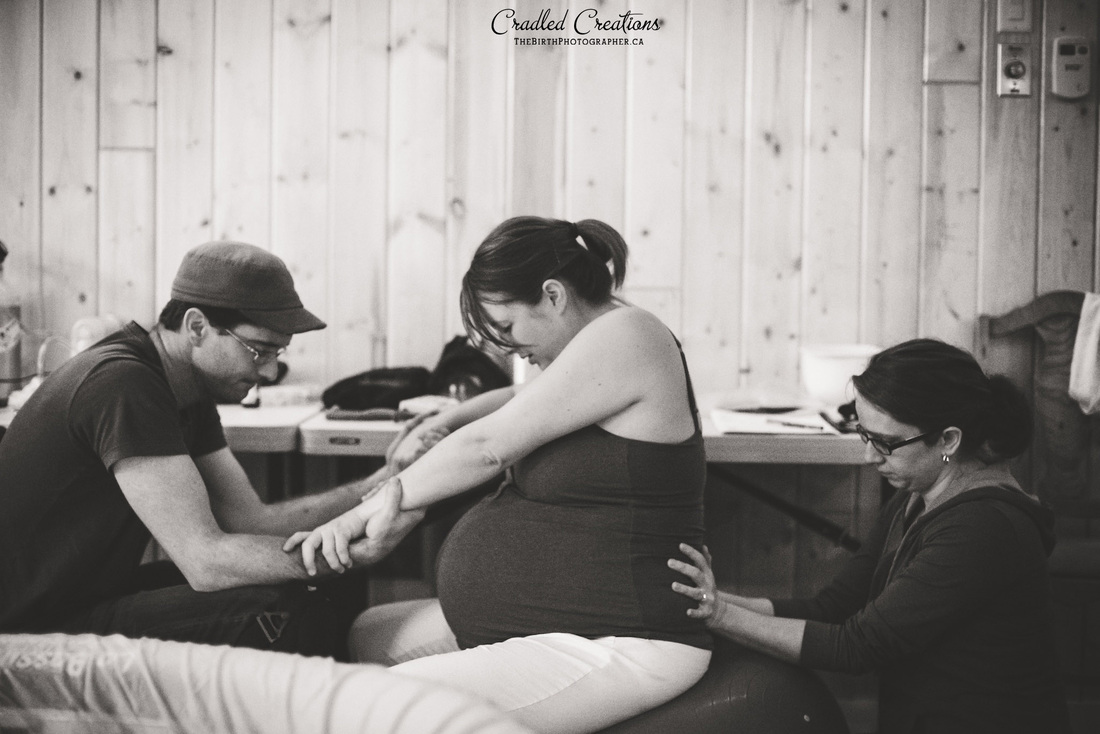 doula support: birth photo by Cradled Creations