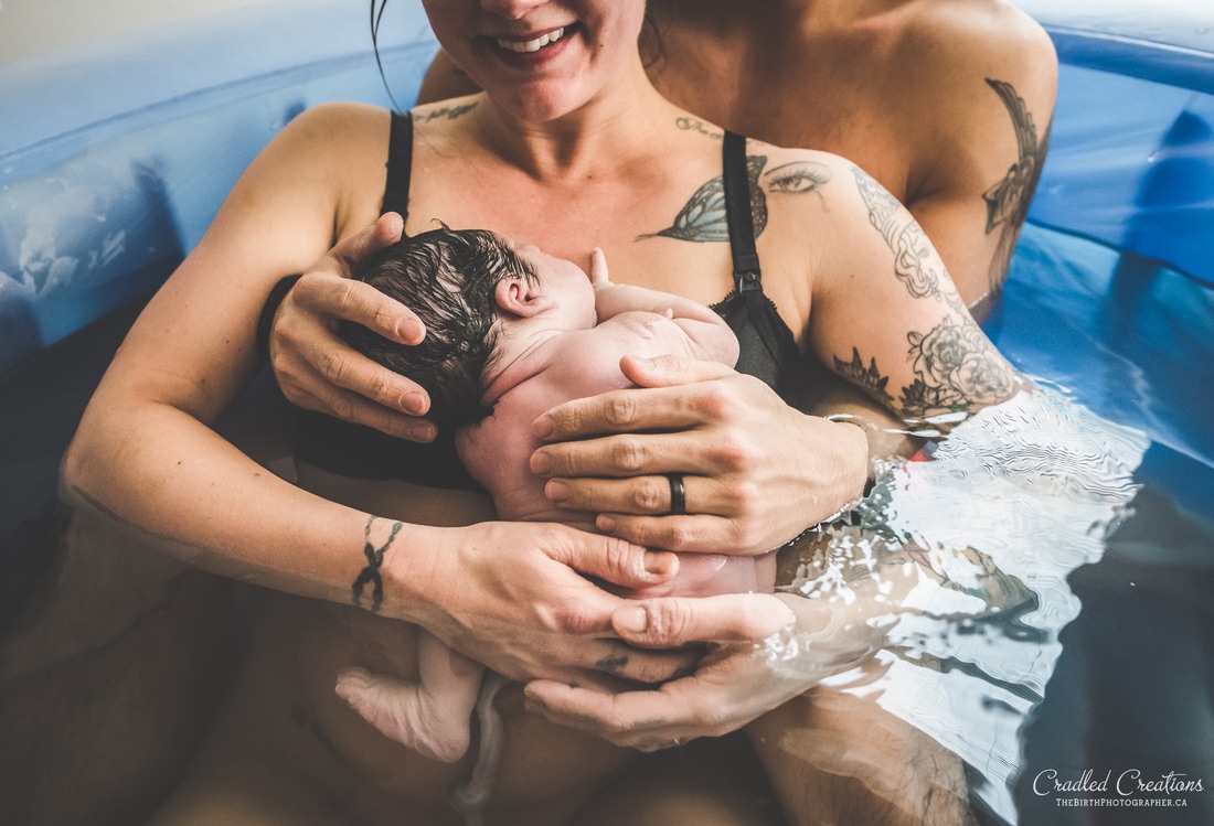 newborn birth baby in water